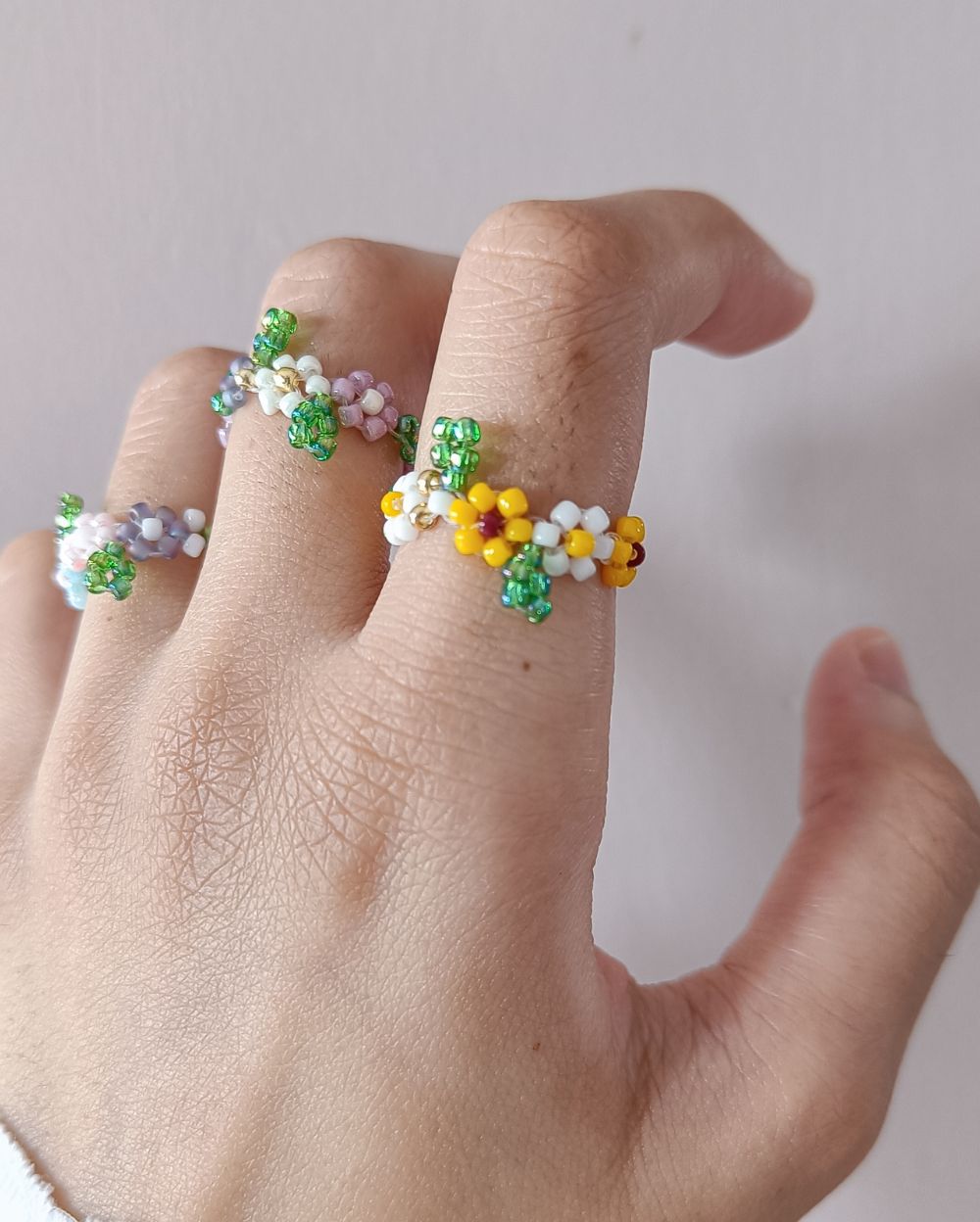Unique and handmade flower beaded rings that are available in all the sizes