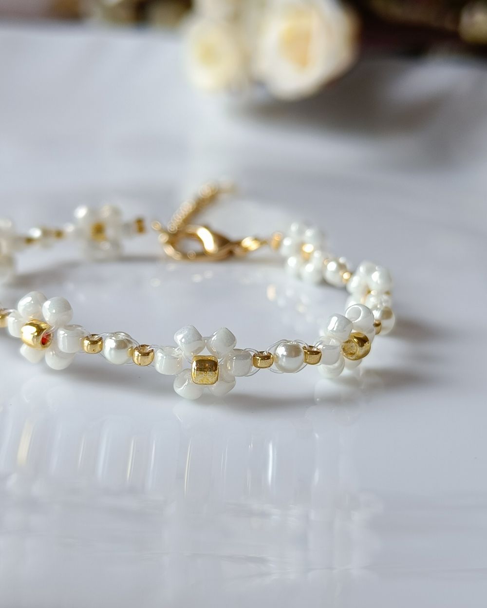 Aesthetic and unique flower beaded bracelet that is handmade with high quality Japanese seed beads and is perfect to pair with any outfit.