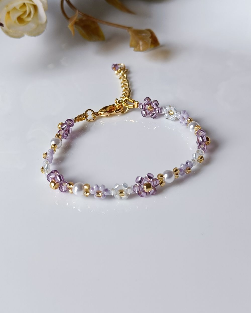 Purple flower beaded bracelet that is handmade with the finest Japanese seed beads and makes a perfect choice for your loved ones