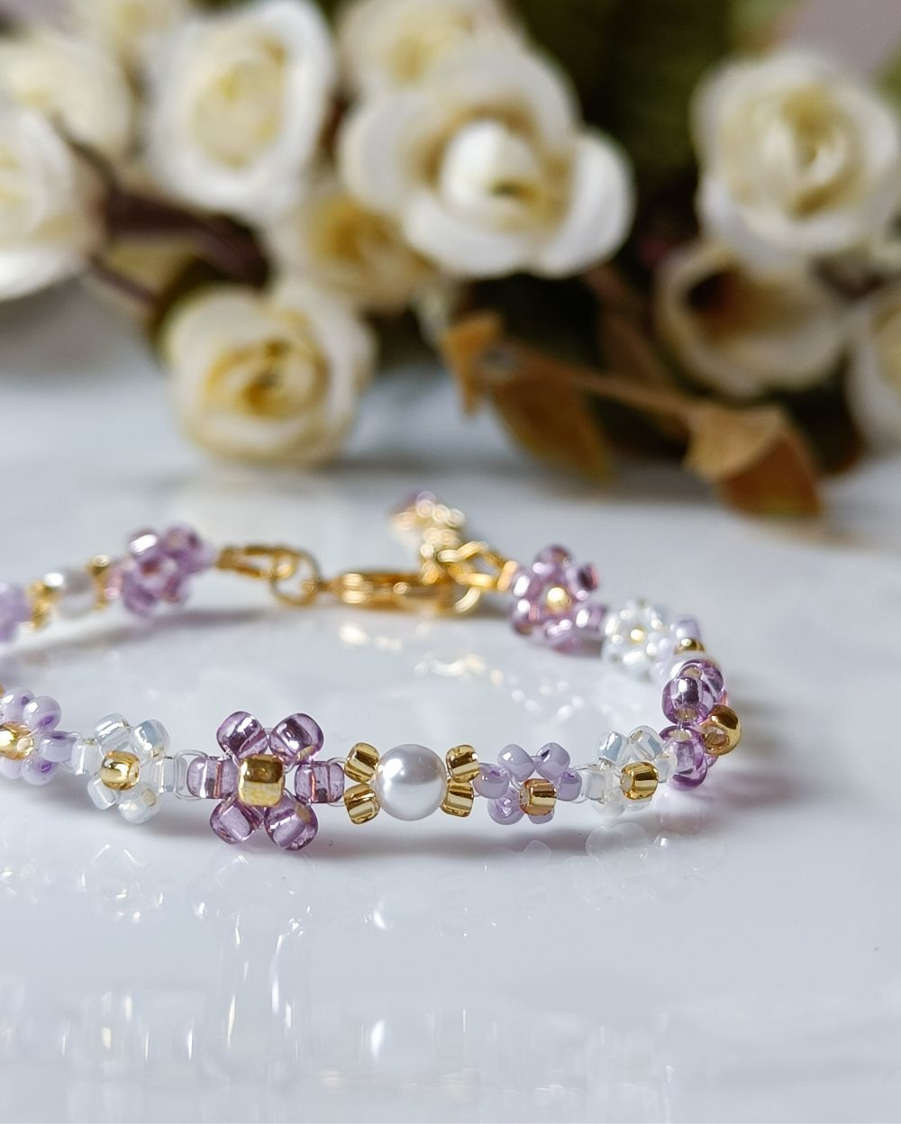 Purple flower beaded bracelet that is handmade with the finest Japanese seed beads and makes the perfect choice for gifting