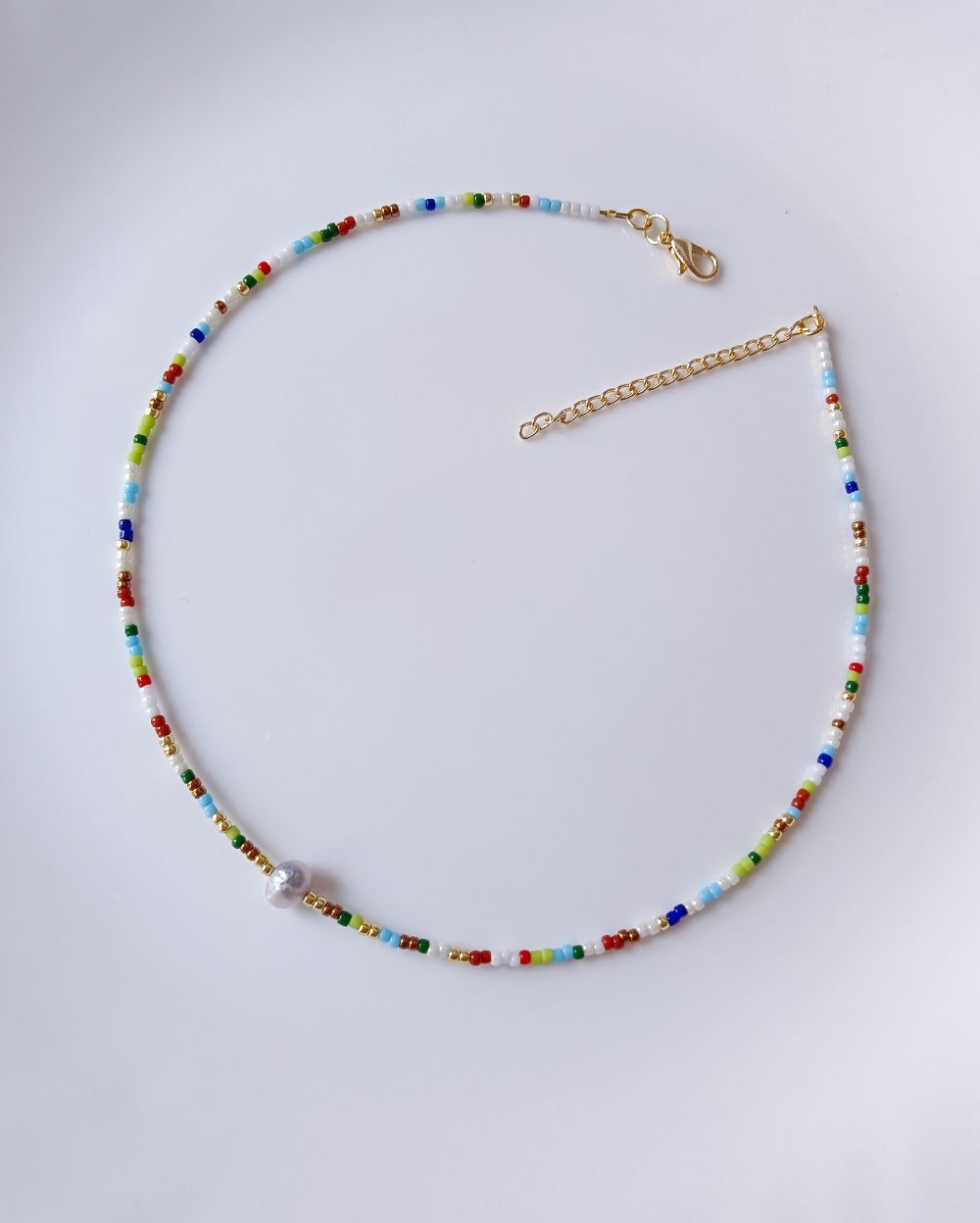 Minimal and chic beaded necklace for women that is perfect for summer vacation and casual outings