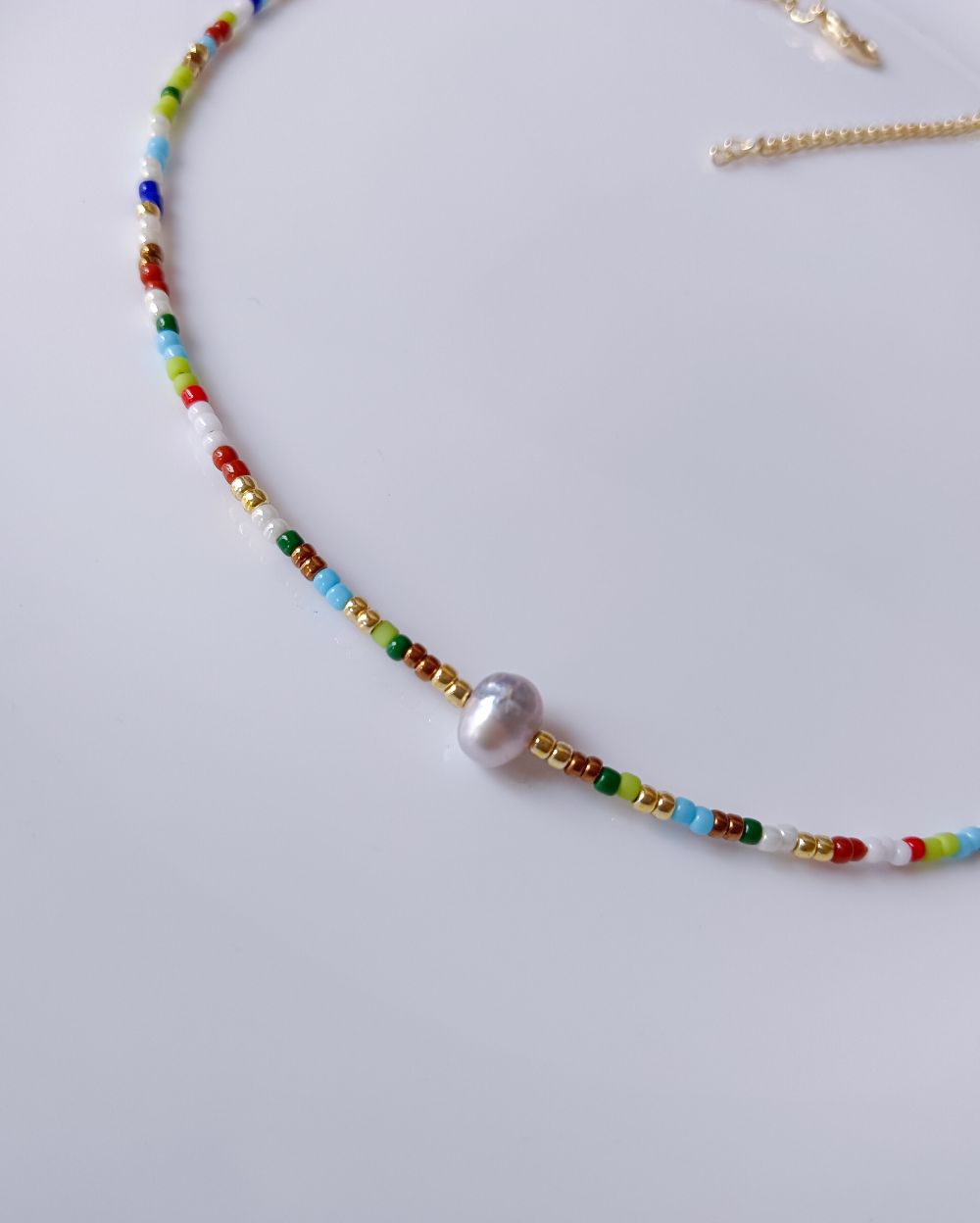 Minimal and dainty boho beaded necklace that is made with Japanese seed beads and is perfect foe summer vacation and casual outings