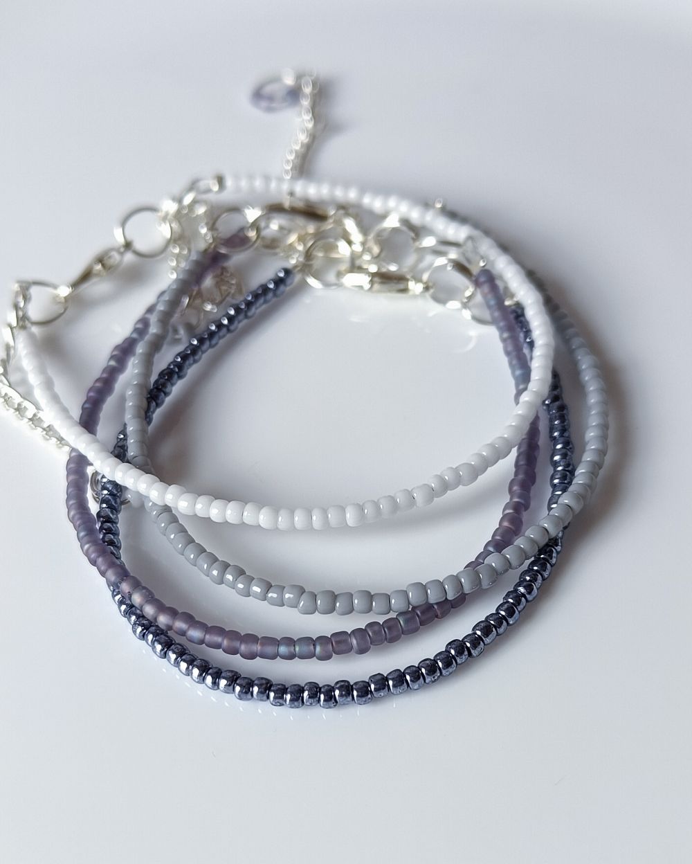 Dainty and chic winter inspired combo of beaded bracelets that is handcrafted with high quality Japanese seed beads and is versatile to pair with any outfit.