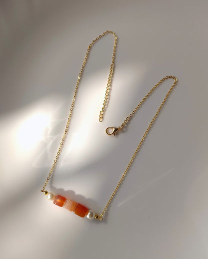 Minimal anti-tarnish locket necklace that is handcrafted with natural agate stone and is ideal for gifting your loved one.