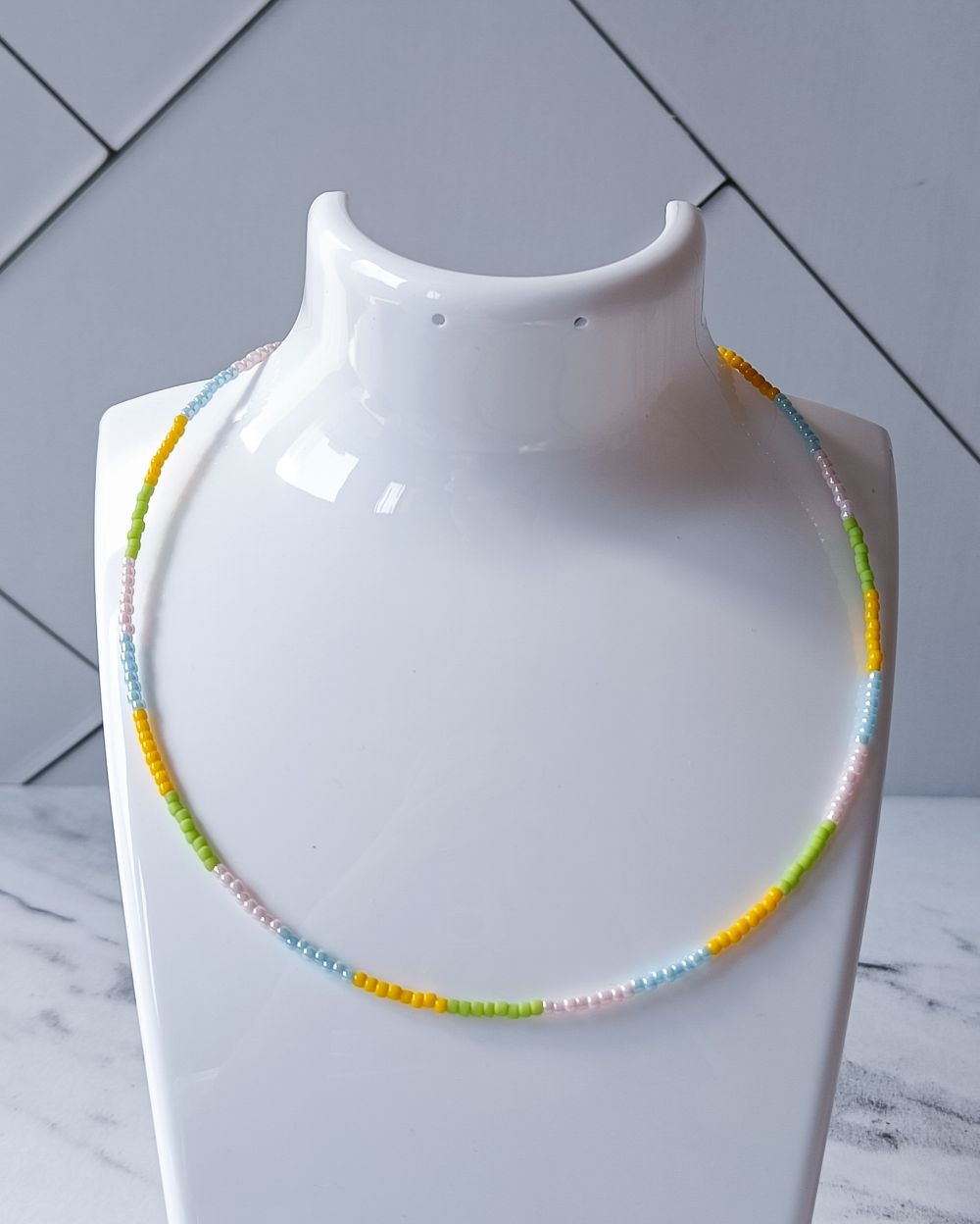 Minimal and dainty beaded necklace made in pastel hues made with high quality Japanese seed beads