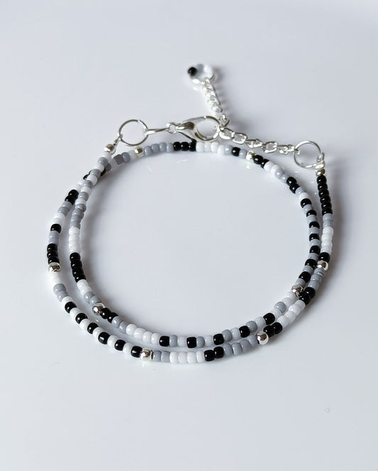 Boho stackable bracelets for women that is handmade with high quality Japanese seed beads and in black and white shades. It's chic and versatile to pair with any outfit and can also be styled as choker necklace.